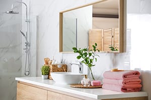 Large mirror over vessel sink in modern bathroom