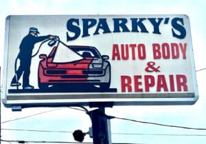 Business sign for auto body and repair shop
